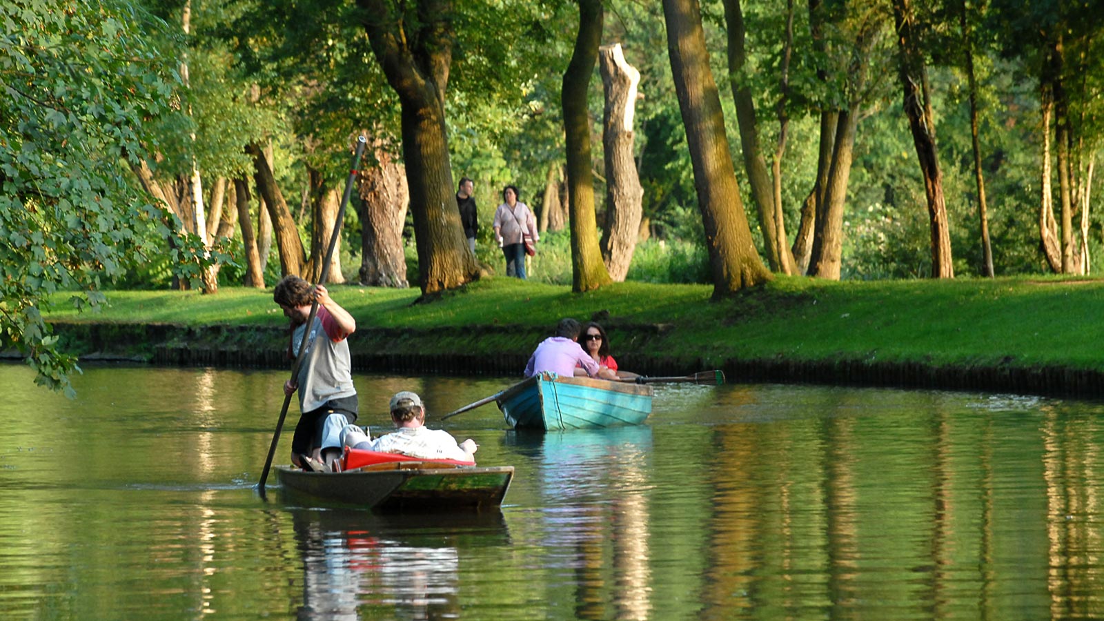 Punt and rowing boat on river